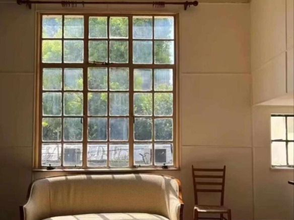 Stunning Spanish-style heritage mansion at 2018 Huaihai Road, FFC. Entire second floor – 189 sqm with domed ceiling and rooftop terrace. Available for rent (46k/month) or sale (33M).