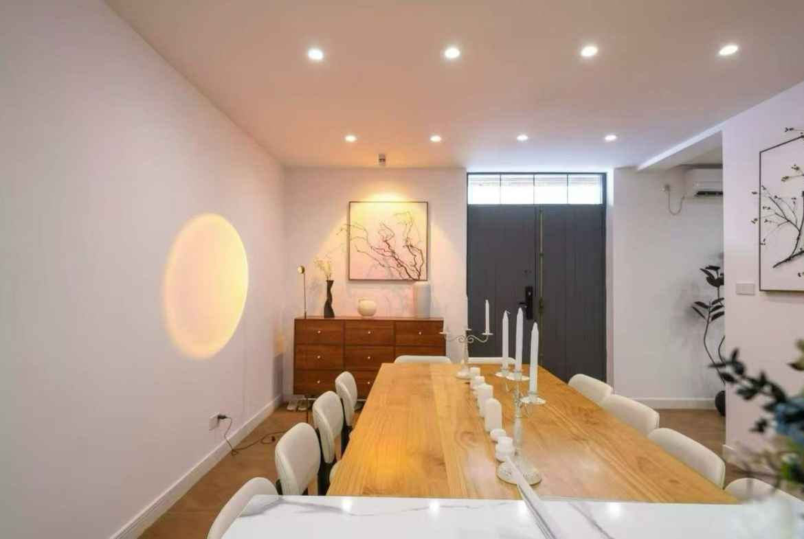Standalone lane house on protected Hunan Road. 280 sqm, 5 bedrooms, 60 sqm roof terrace, parking available. Live, office, or showroom. 48,000 RMB/month.