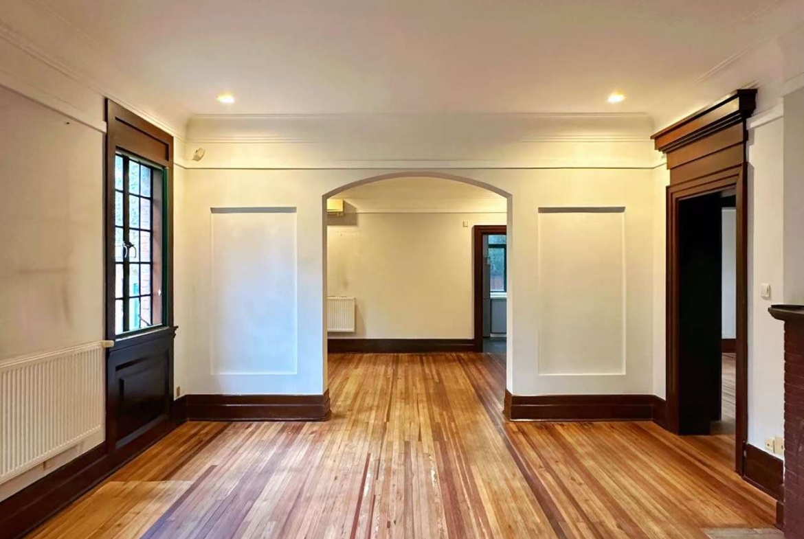 1928 heritage garden villa on protected Hunan Road. Main building first floor plus separate annex. 150 sqm private garden, garage included. 58,000 RMB/month.