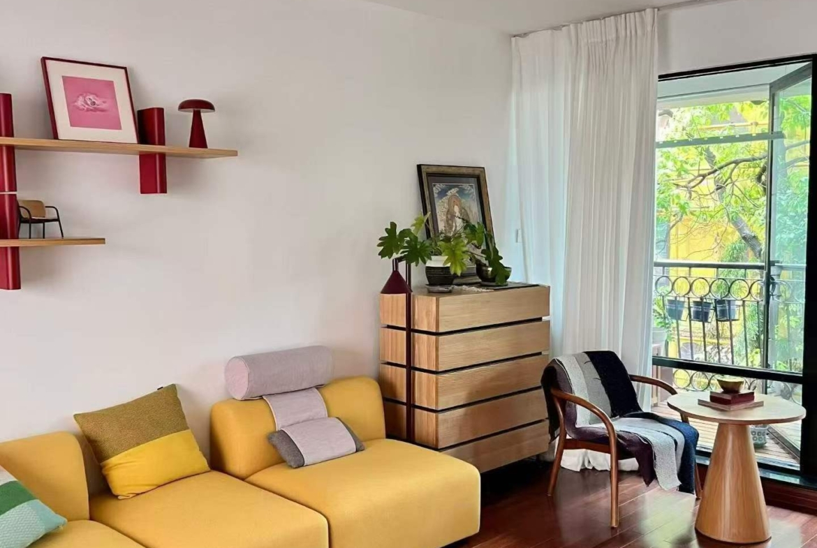One of the exclusive "Four Mansions" on Hunan Road. 117 sqm, 2 beds, 2 baths, underground parking included. Quiet, tree-lined, celebrity-favored address. 24,000 RMB/month.