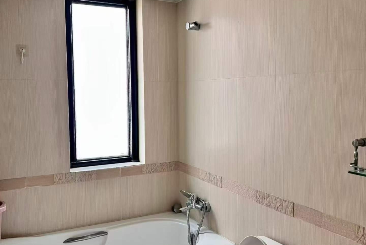 One of the exclusive "Four Mansions" on Hunan Road. 117 sqm, 2 beds, 2 baths, underground parking included. Quiet, tree-lined, celebrity-favored address. 24,000 RMB/month.