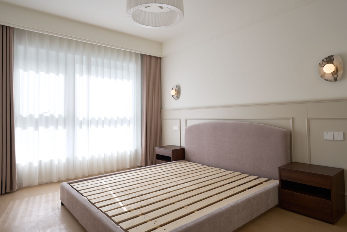 High floor 2-bed unit at Eight Park Avenue in Jing'an. 116 sqm, full underfloor heating + central AC. Close to Changping Road Station. 29,800 RMB/month.