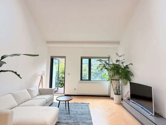 Garden lane house at Huaihai Road & Huashan Road intersection in the Former French Concession. 200 sqm, 3 beds, wall heating, central AC. 35,000 RMB/month.