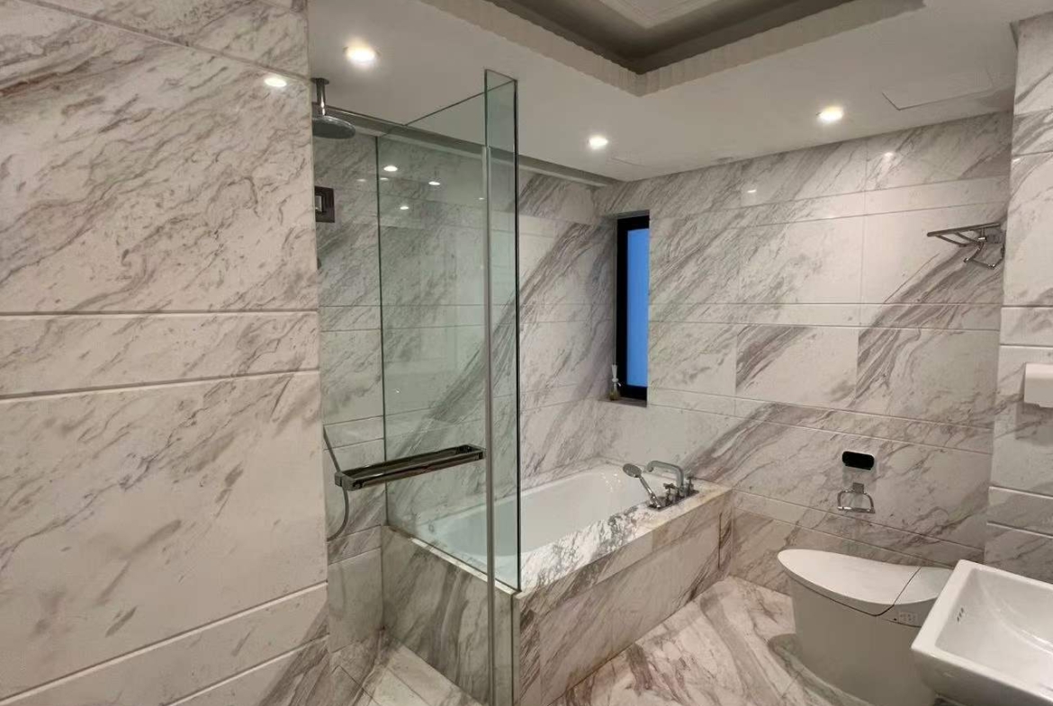 High floor 2-bed, 2-bath unit at The Palace Phase 2 in the Former French Concession. 140 sqm, underfloor heating, central AC, clubhouse amenities. 36,000 RMB/month.