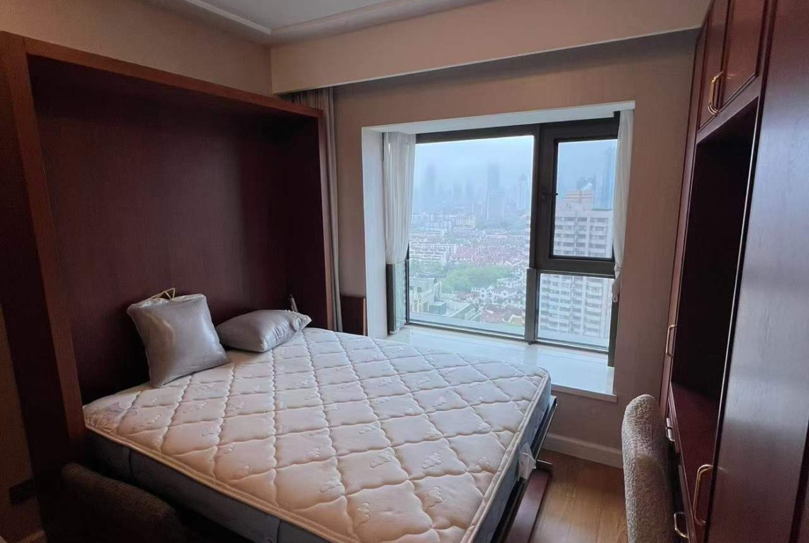 High floor 2-bed, 2-bath unit at The Palace Phase 2 in the Former French Concession. 140 sqm, underfloor heating, central AC, clubhouse amenities. 36,000 RMB/month.