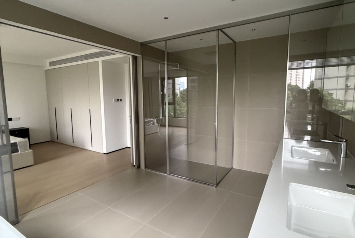 Top floor penthouse at The Summit in the Former French Concession. 5+1 bedrooms, 4 bathrooms, large private terrace. Steps from Anfu Road. 100,000 RMB/month.