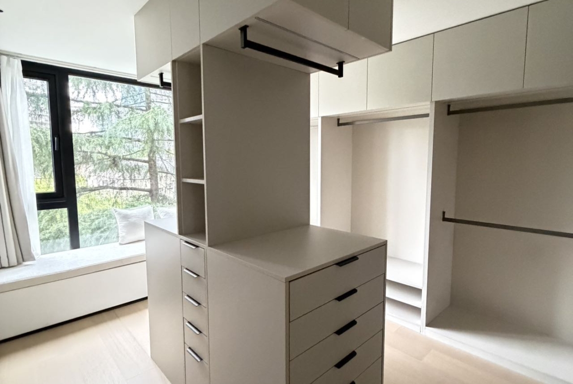 Top floor penthouse at The Summit in the Former French Concession. 5+1 bedrooms, 4 bathrooms, large private terrace. Steps from Anfu Road. 100,000 RMB/month.