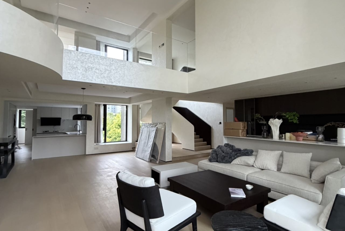 Top floor penthouse at The Summit in the Former French Concession. 5+1 bedrooms, 4 bathrooms, large private terrace. Steps from Anfu Road. 100,000 RMB/month.