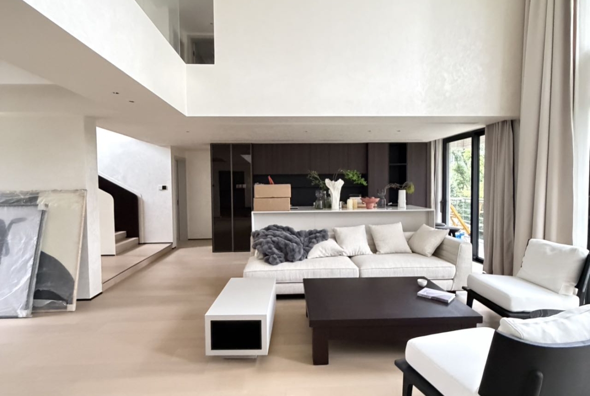 Top floor penthouse at The Summit in the Former French Concession. 5+1 bedrooms, 4 bathrooms, large private terrace. Steps from Anfu Road. 100,000 RMB/month.