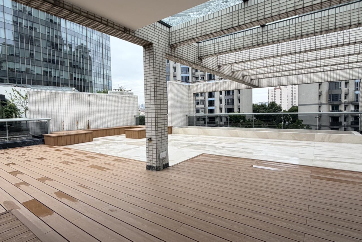 Top floor penthouse at The Summit in the Former French Concession. 5+1 bedrooms, 4 bathrooms, large private terrace. Steps from Anfu Road. 100,000 RMB/month.