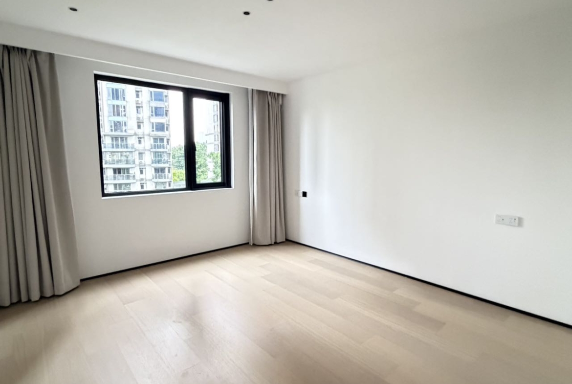 Top floor penthouse at The Summit in the Former French Concession. 5+1 bedrooms, 4 bathrooms, large private terrace. Steps from Anfu Road. 100,000 RMB/month.