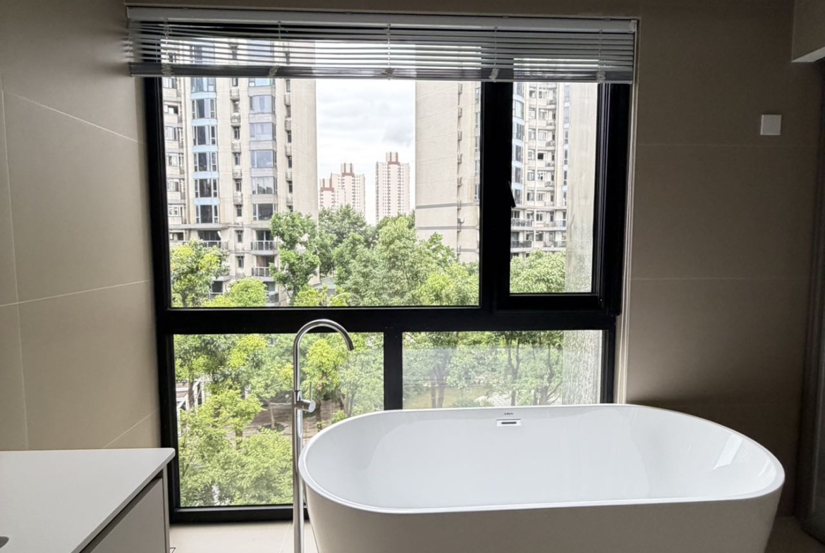 Top floor penthouse at The Summit in the Former French Concession. 5+1 bedrooms, 4 bathrooms, large private terrace. Steps from Anfu Road. 100,000 RMB/month.
