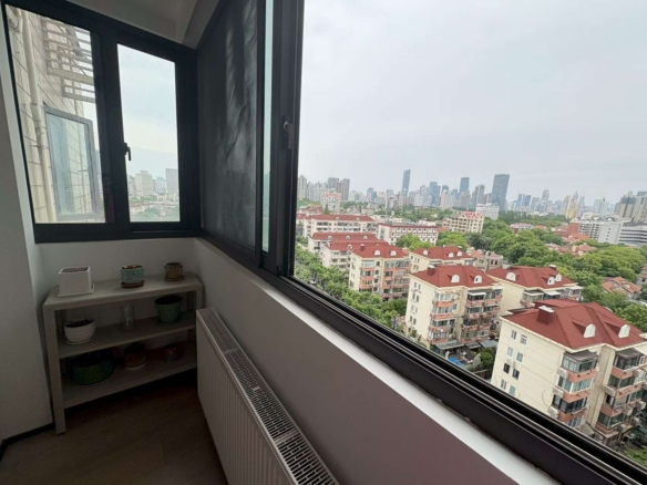 3-bed, 2-bath unit at Xingguo Mansion on Wukang Road / Huaihai Road. 150 sqm, third bedroom can be office, oven, wall heating. 26,000 RMB/month negotiable.