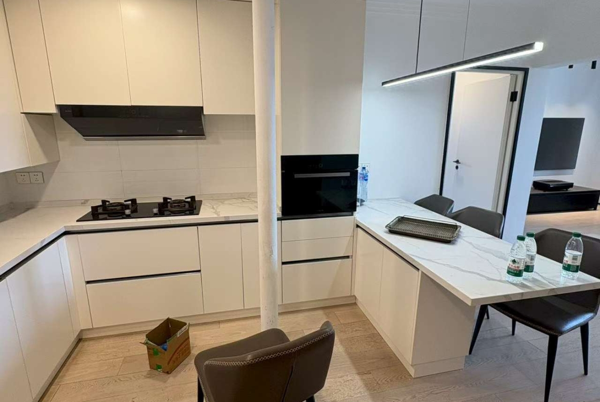3-bed, 2-bath unit at Xingguo Mansion on Wukang Road / Huaihai Road. 150 sqm, third bedroom can be office, oven, wall heating. 26,000 RMB/month negotiable.