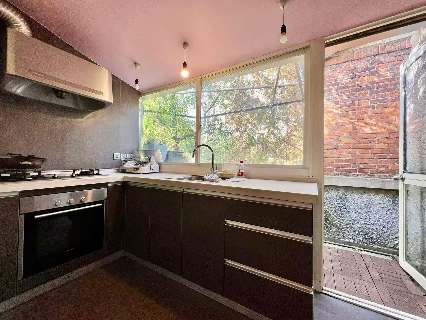 anfu-road-lane-house-ffc-2-bed-2-bath-balcony (2) Authentic lane house apartment on Anfu Road with private balcony. 2 beds, 2 living rooms, heritage building, walk to cafes. 18,000 RMB/month.