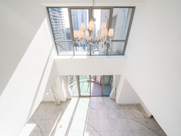 Top floor penthouse duplex at Jing'an Four Seasons above Nanjing West Road Station. 270 sqm, 3 beds, 4 baths, underfloor heating + central AC.物业费 included. 42,000 RMB/month.