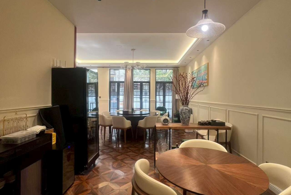 Ground floor lane house on North Urumqi Road with private garden. 100 sqm, 1 bed, 1 bath, 30 sqm garden. Live or work. 22,000 RMB/month.