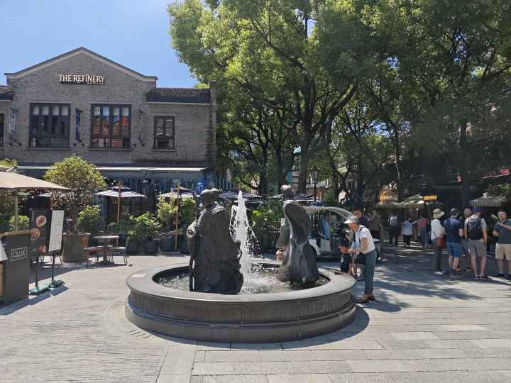 A complete guide to Xintiandi: the history of its transformation, the difference between North and South Block, where to eat, and when to visit.