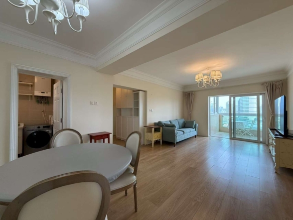 2-bed, 2-bath unit at Ambassy Court on Huaihai Road. 123 sqm, southeast facing, large balcony, underfloor heating, clubhouse with pools and gym. 25,000 RMB/month.