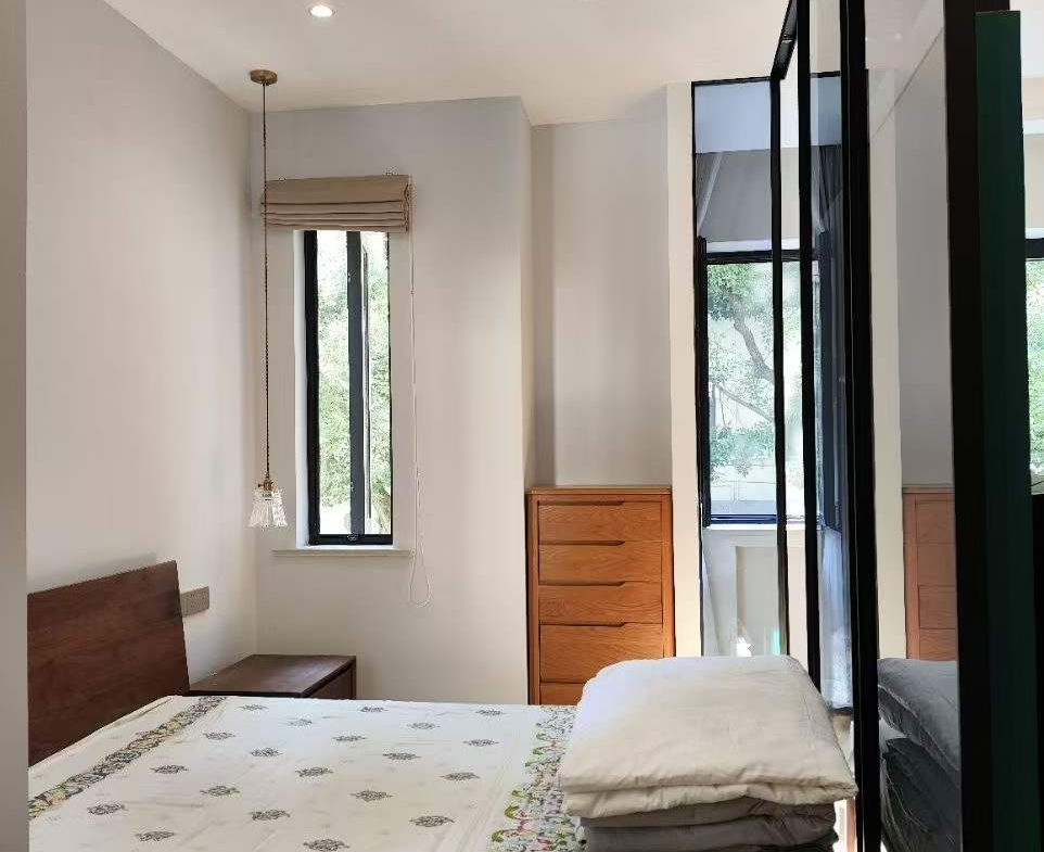 2+1 bedroom unit on Dechang Road in Xuhui, near Former French Concession. 120 sqm, 2nd floor walk-up, school catchment. 18,000 RMB/month or 17M sale.