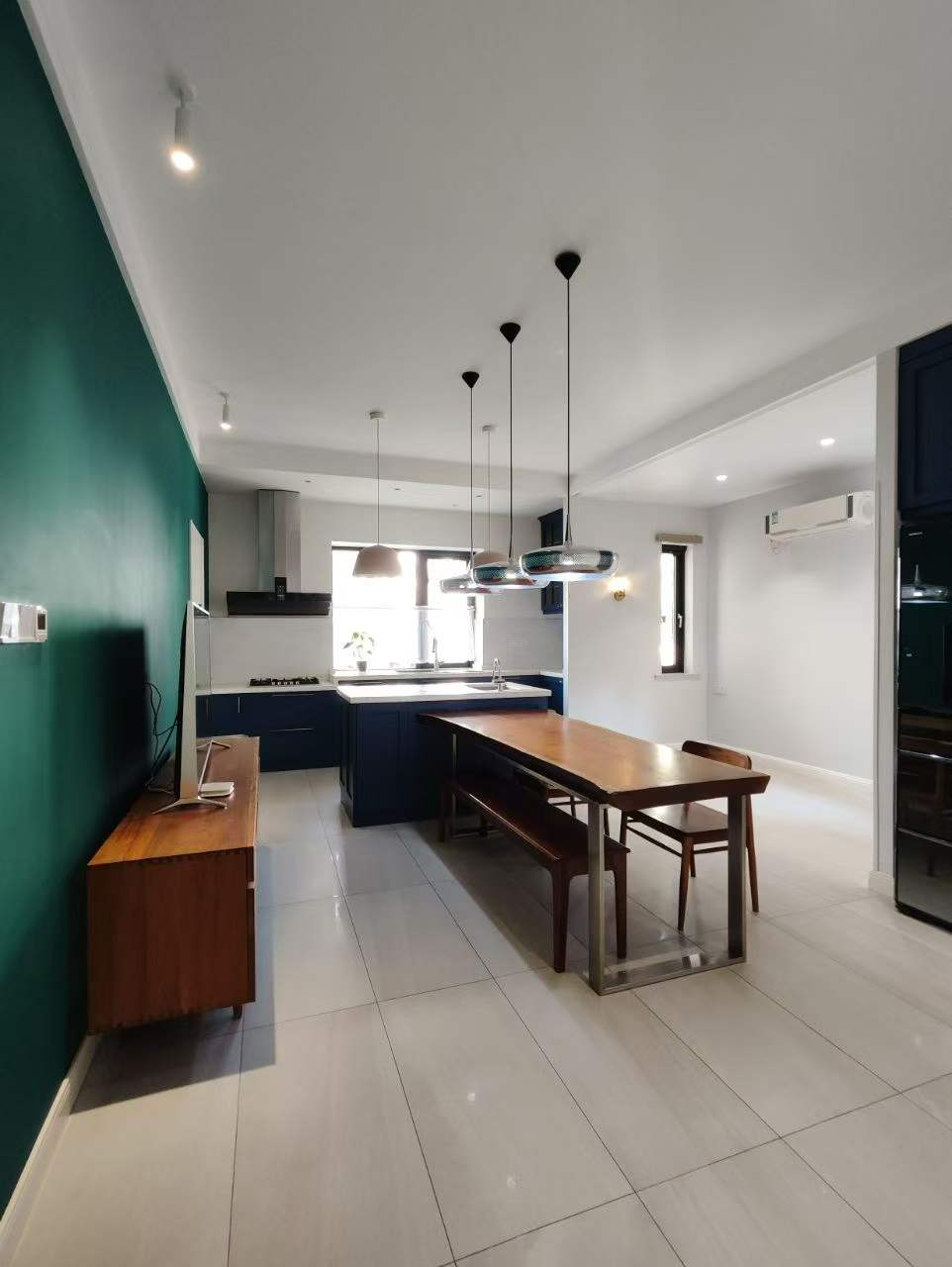 2+1 bedroom unit on Dechang Road in Xuhui, near Former French Concession. 120 sqm, 2nd floor walk-up, school catchment. 18,000 RMB/month or 17M sale.