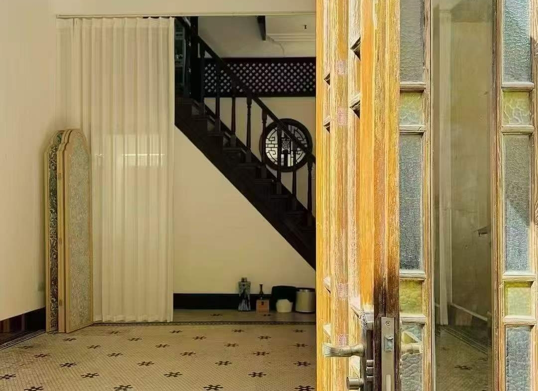 Entire protected lane house on Julu Road. 4 beds, 3 baths, 210 sqm, courtyard, terrace, wall heating. Live or work in the heart of Ju Fu Chang. 26,800 RMB/month.