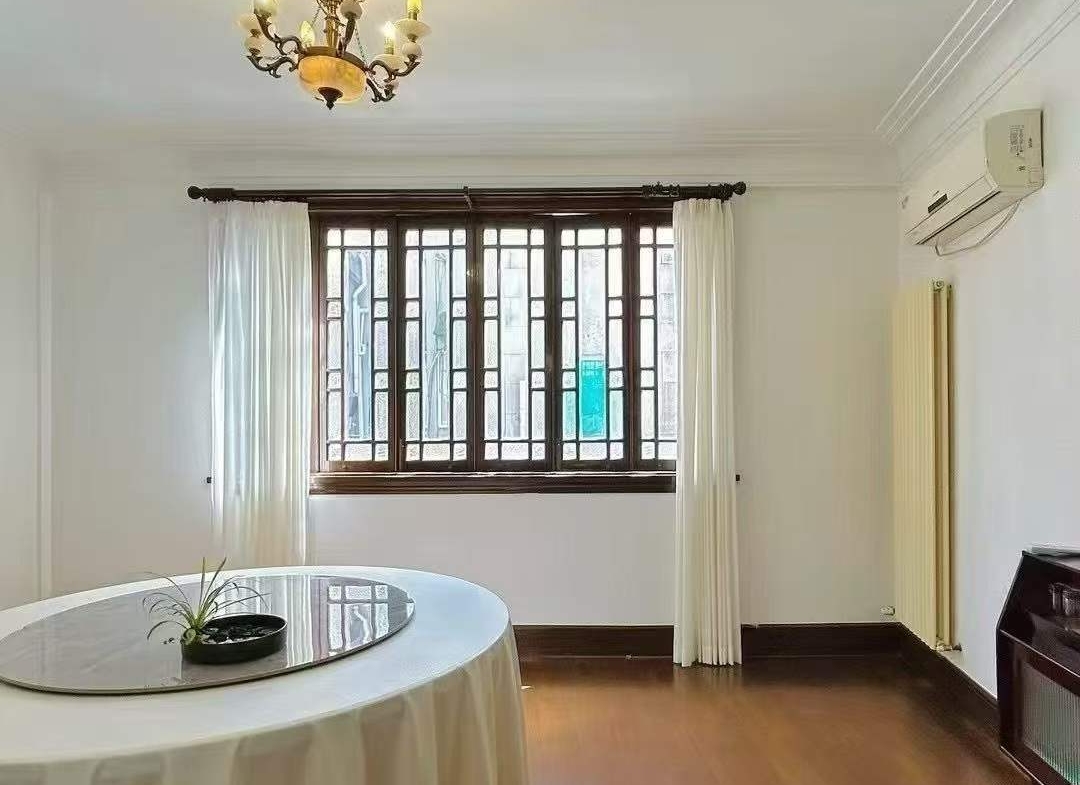Entire protected lane house on Julu Road. 4 beds, 3 baths, 210 sqm, courtyard, terrace, wall heating. Live or work in the heart of Ju Fu Chang. 26,800 RMB/month.