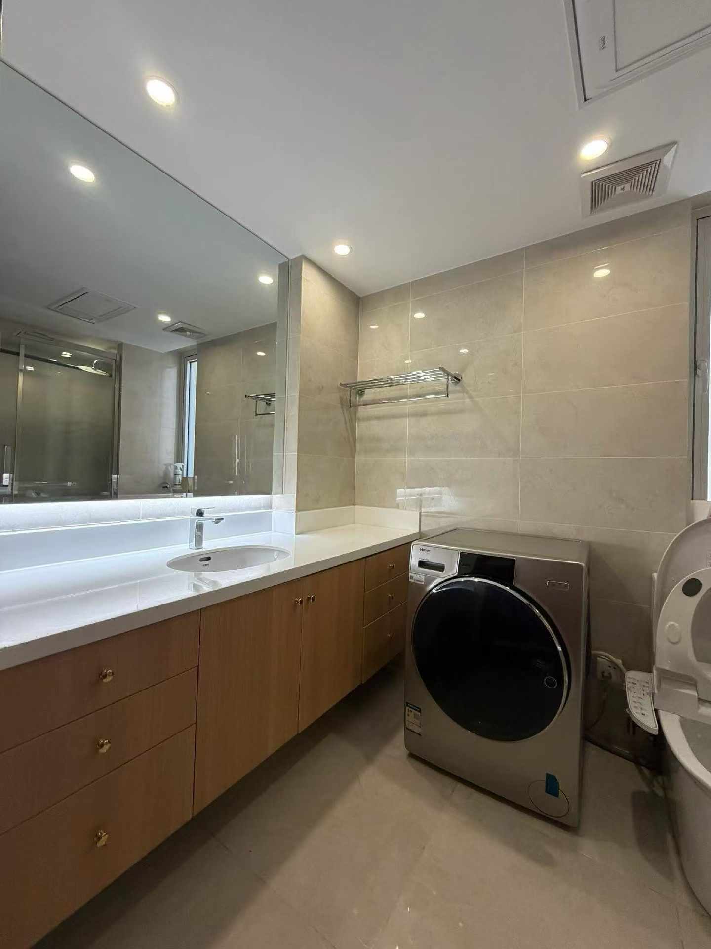 High floor 2-bed unit at Shanghai Grand Plaza on Julu Road. Southeast facing, Lujiazui skyline view, pool view, long-term lease available. 22,000 RMB/month.