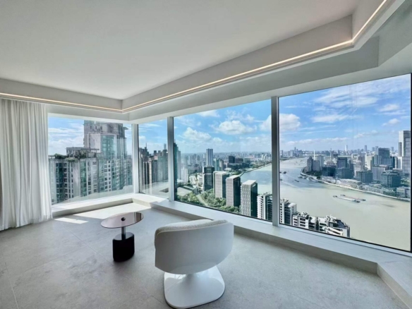 Unobstructed river-view 4-bed unit at Shimao Riviera Garden in Lujiazui. 315 sqm, panoramic Bund views, 70% greenery, clubhouse. 88,000 RMB/month.