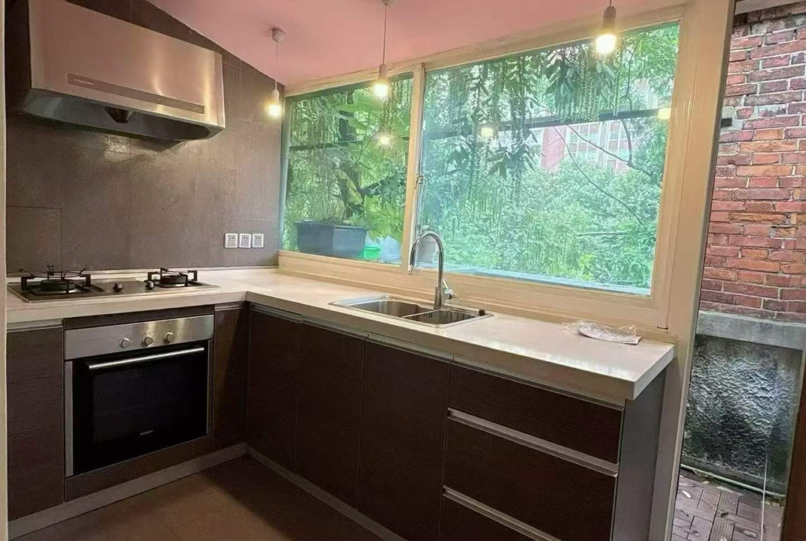 3rd floor unit on Anfu Road near Wukang Road. 2 beds, 2 living rooms, 1 bath, north-south through, private balcony. Prime FFC location. 17,000 RMB/month.