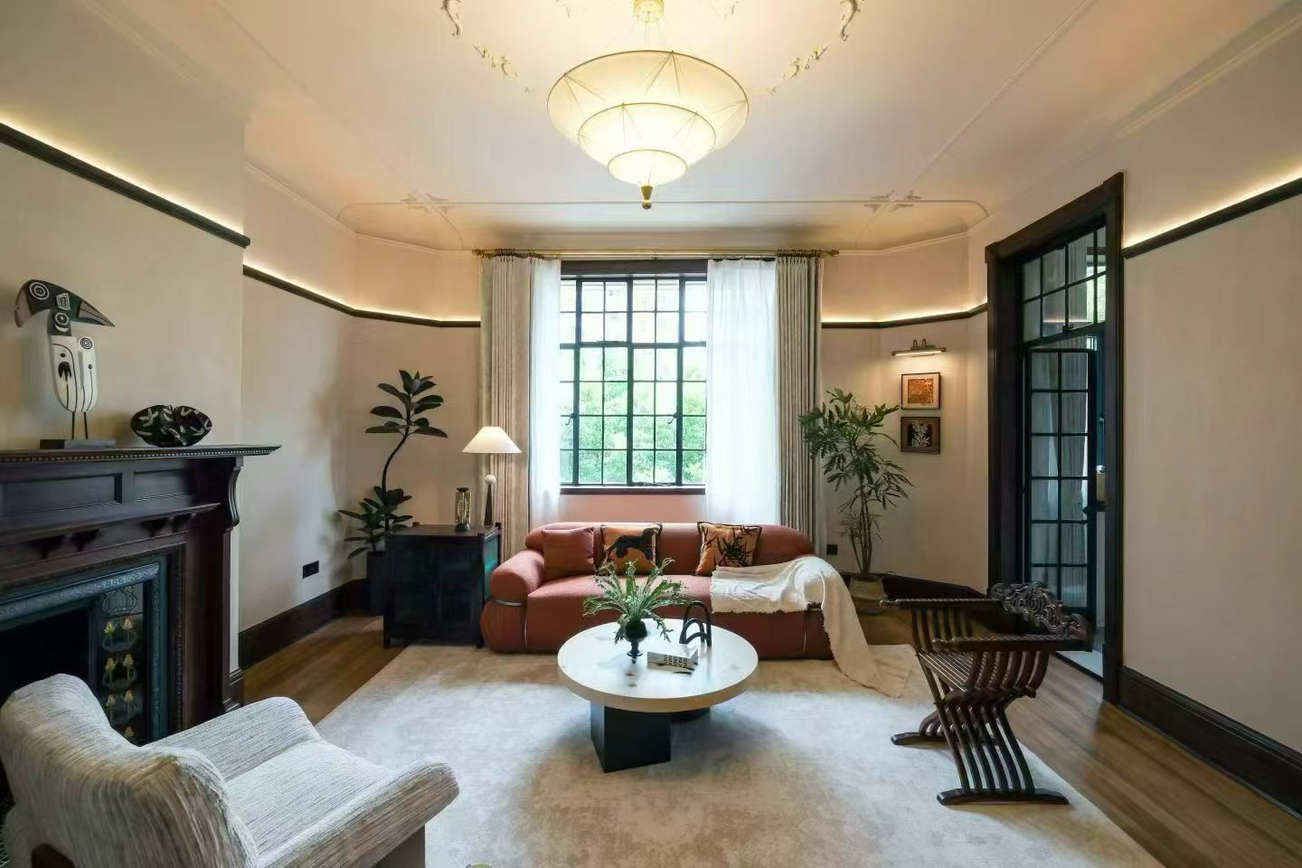 2-bed, 2-bath heritage unit at Pass Apartment on Changshu Road. 150 sqm, 80 sqm terrace, original fireplace, first rental. Steps from metro. 42,800 RMB/month.