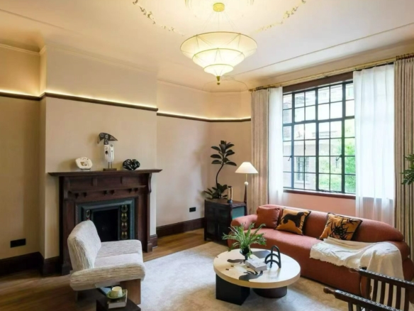 2-bed, 2-bath heritage unit at Pass Apartment on Changshu Road. 150 sqm, 80 sqm terrace, original fireplace, first rental. Steps from metro. 42,800 RMB/month.