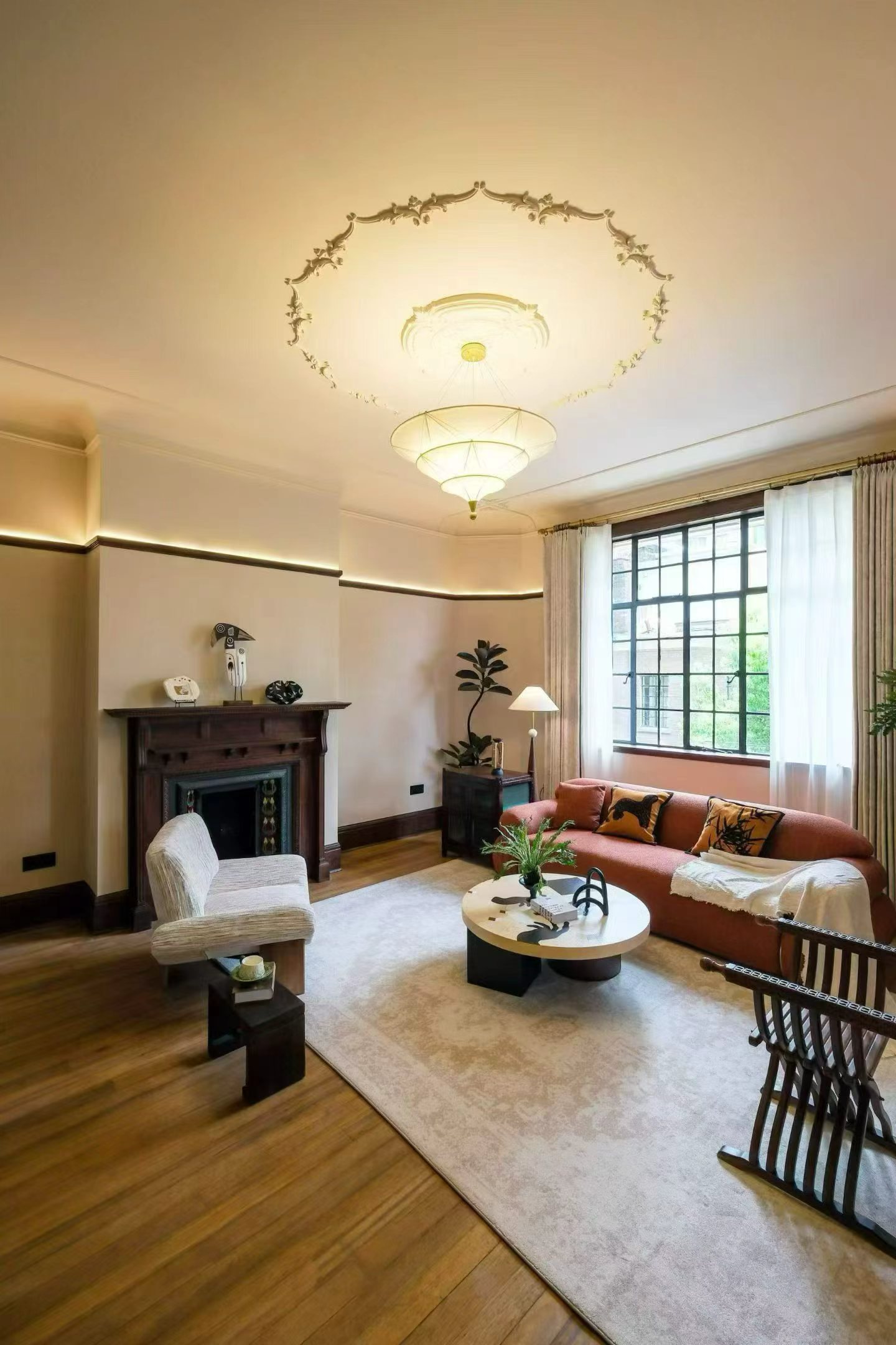2-bed, 2-bath heritage unit at Pass Apartment on Changshu Road. 150 sqm, 80 sqm terrace, original fireplace, first rental. Steps from metro. 42,800 RMB/month.