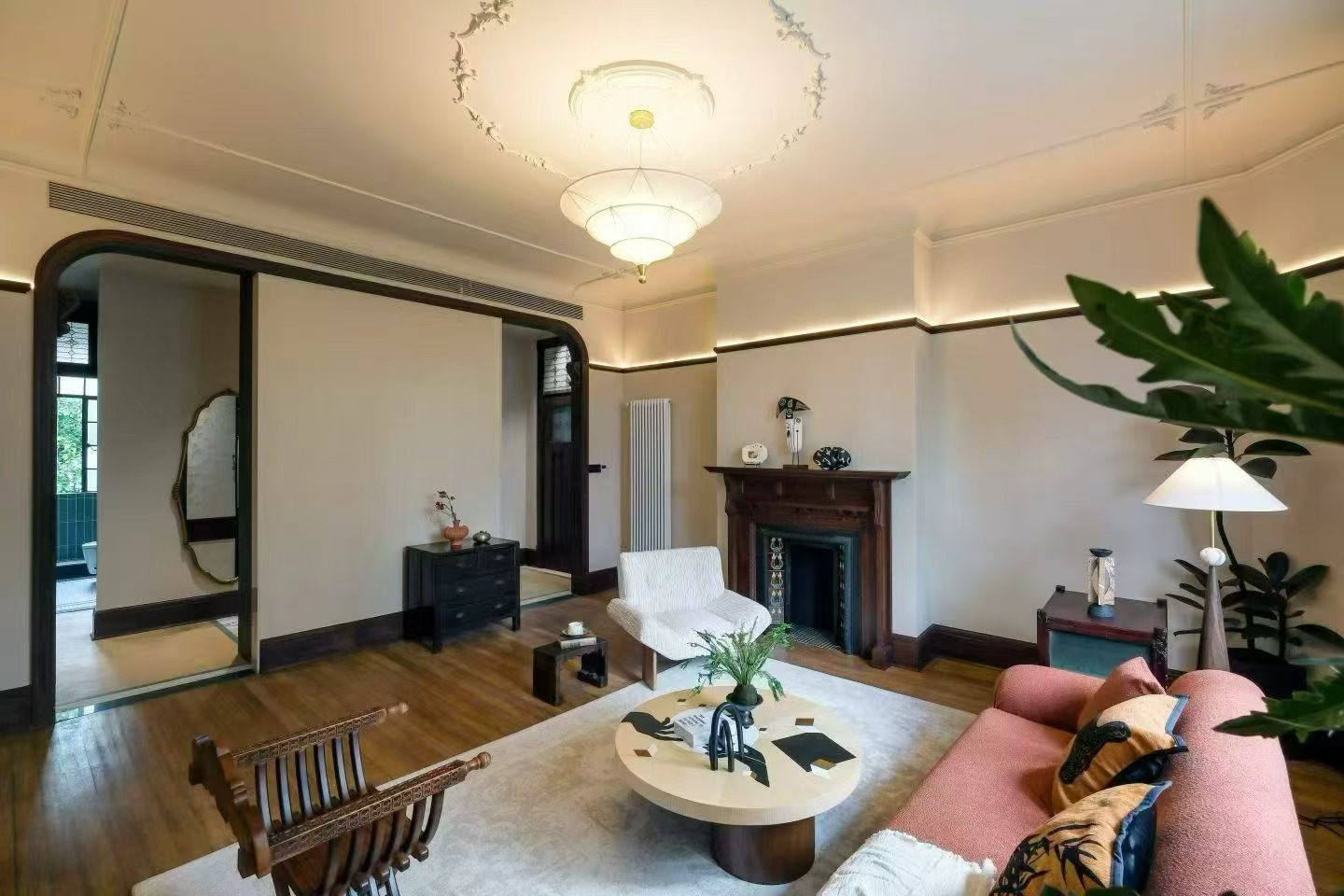 2-bed, 2-bath heritage unit at Pass Apartment on Changshu Road. 150 sqm, 80 sqm terrace, original fireplace, first rental. Steps from metro. 42,800 RMB/month.
