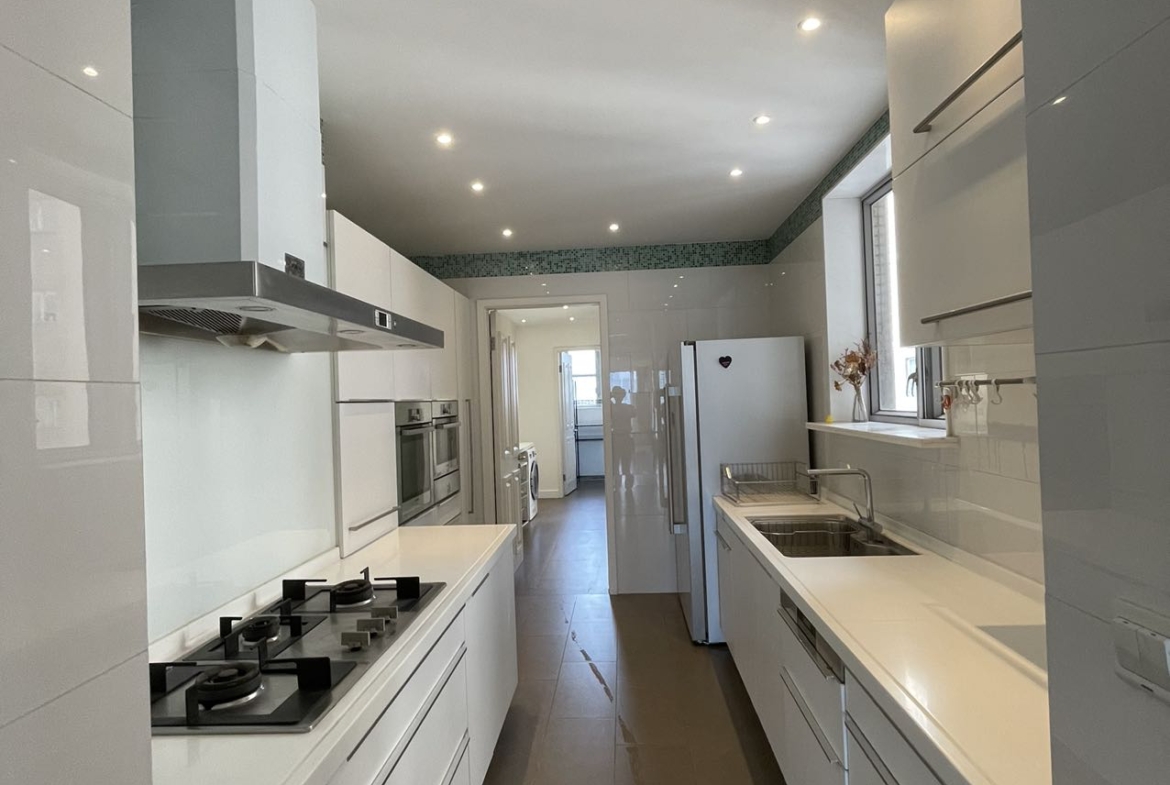 3-bed + maid's room unit at Chevalier Place on Anfu Road. 260 sqm, south-facing, panoramic views, boutique building. 45,000 RMB/month.