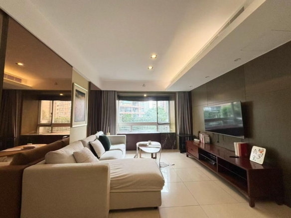 1-bed, 2-living, 1-bath unit at City Castle in Jing'an. 75 sqm, central AC, balcony, clubhouse access. Near Nanjing West Road. 16,600 RMB/month.