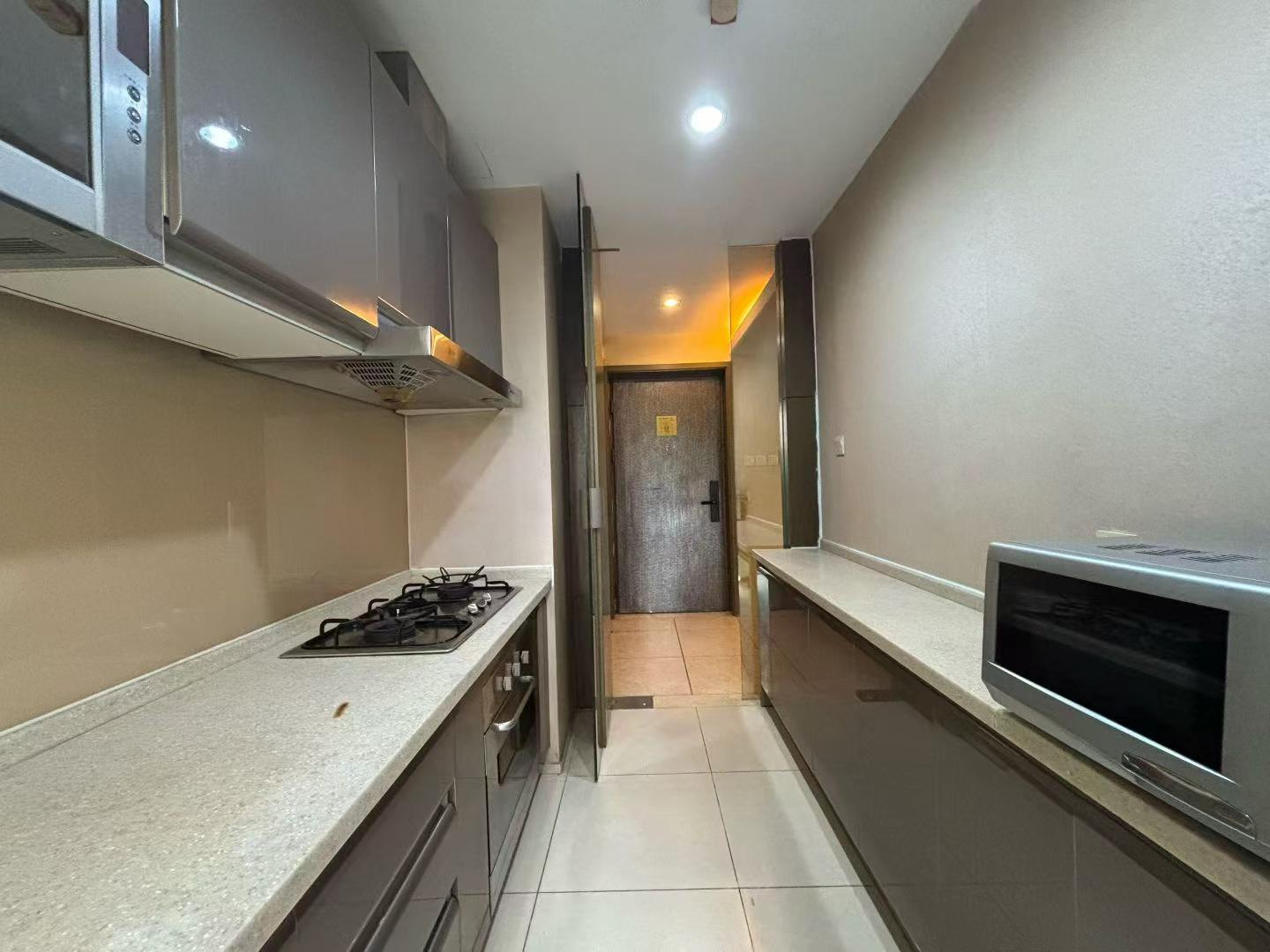 city-castle-1-bed-1-bath-clubhouse-prime-jingan-shanghai-rentals (5) 1-bed, 2-living, 1-bath unit at City Castle in Jing'an. 75 sqm, central AC, balcony, clubhouse access. Near Nanjing West Road. 16,600 RMB/month.
