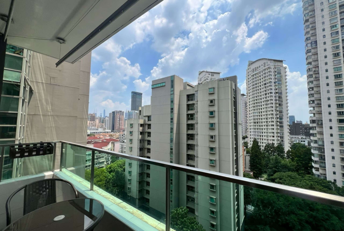 2-bed, 2-bath unit at Eight Park Avenue in Jing'an. 110 sqm, central AC, underfloor heating, clubhouse with pool and gym. 25,800 RMB/month.