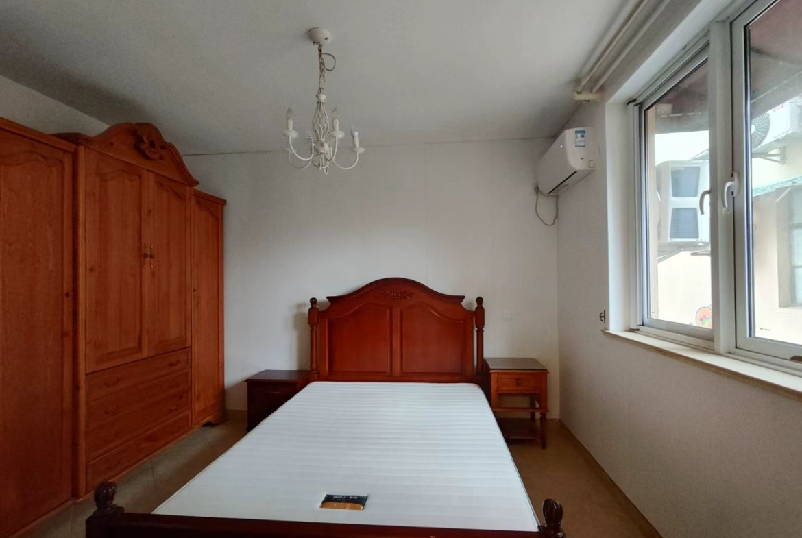 FFC lane house for rent. 1-bed, 1-bath ground floor with private garden. Located on Xingguo Road. 60 sqm, quiet FFC location. 9,500 RMB/month.
