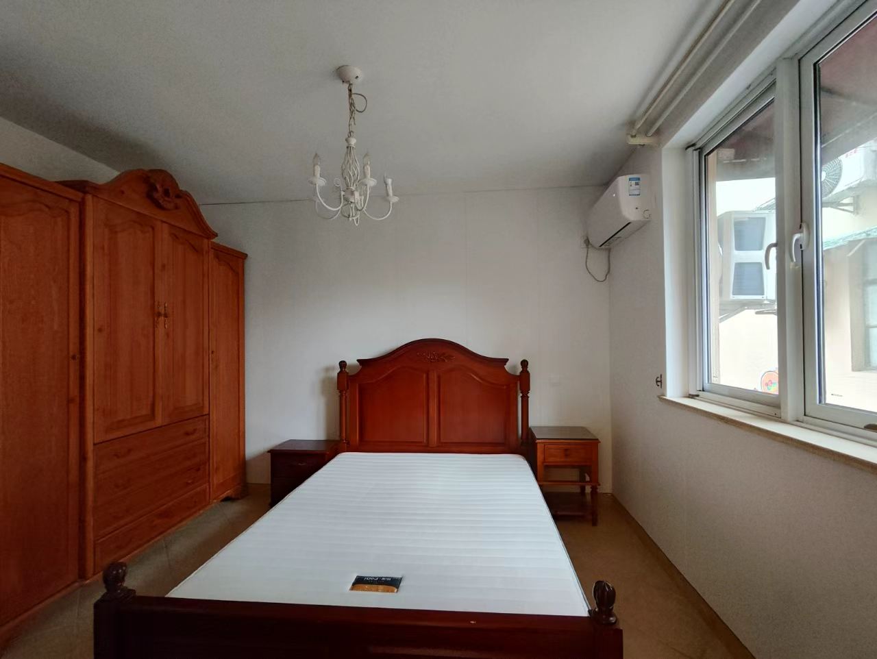 FFC lane house for rent. 1-bed, 1-bath ground floor with private garden. Located on Xingguo Road. 60 sqm, quiet FFC location. 9,500 RMB/month.