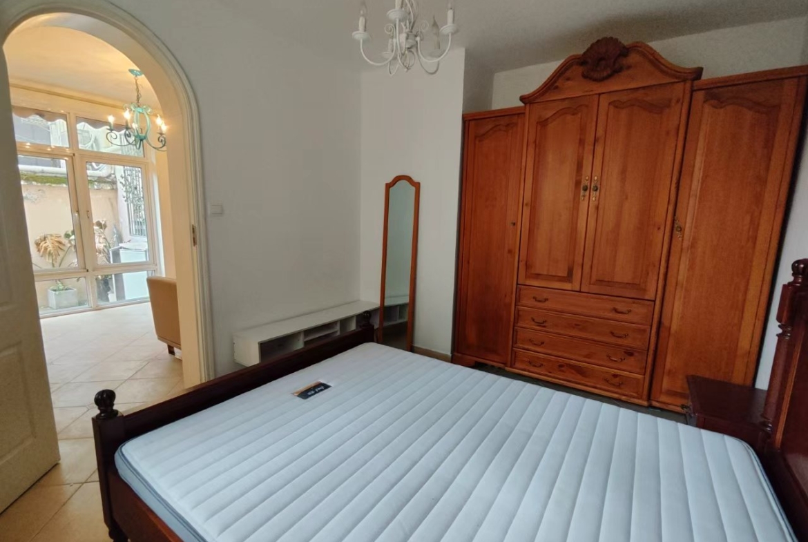 FFC lane house for rent. 1-bed, 1-bath ground floor with private garden. Located on Xingguo Road. 60 sqm, quiet FFC location. 9,500 RMB/month.