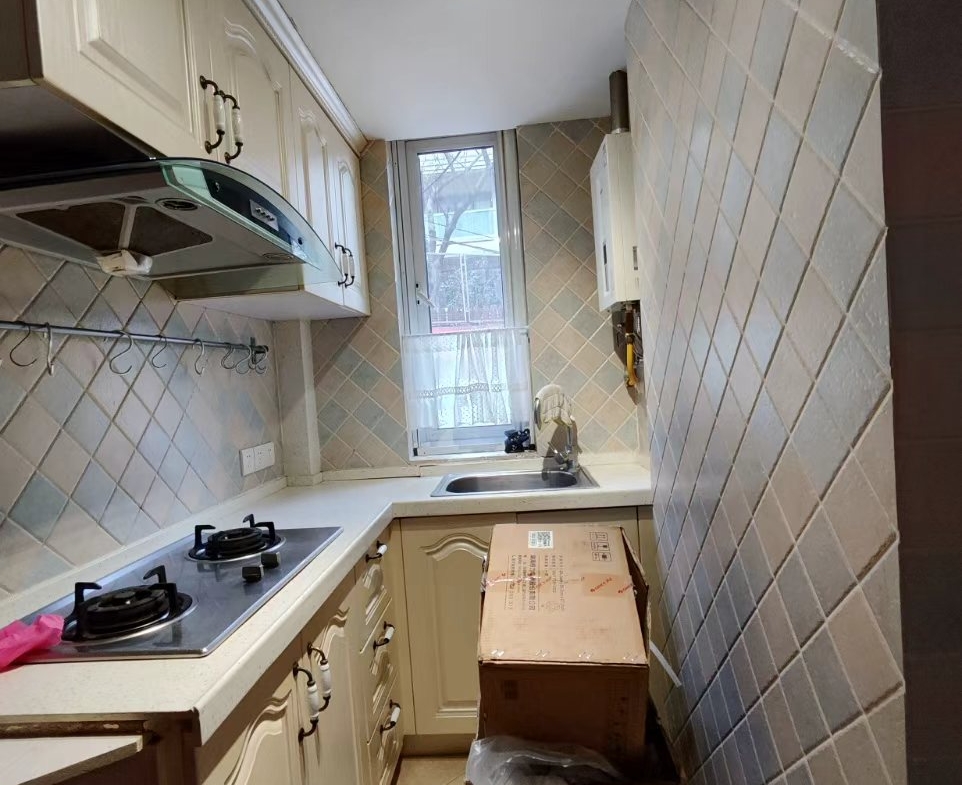 FFC lane house for rent. 1-bed, 1-bath ground floor with private garden. Located on Xingguo Road. 60 sqm, quiet FFC location. 9,500 RMB/month.
