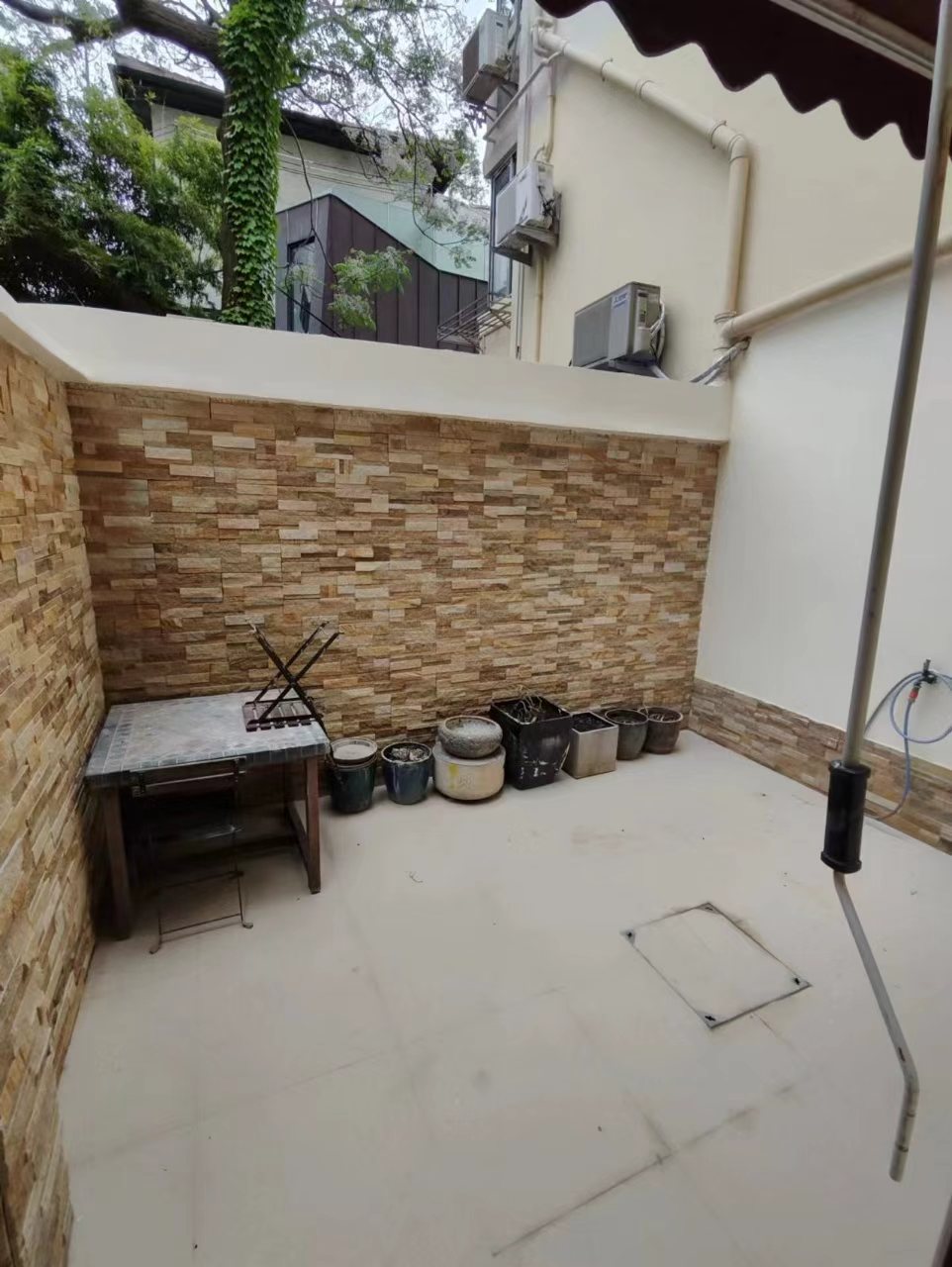 FFC lane house for rent. 1-bed, 1-bath ground floor with private garden. Located on Xingguo Road. 60 sqm, quiet FFC location. 9,500 RMB/month.