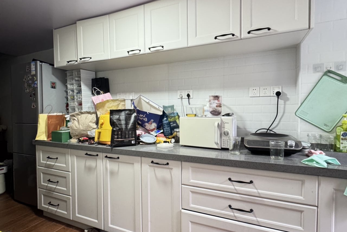 Ground floor studio at Shangfang Garden on Huaihai Road. 70 sqm, 20 sqm garden, 3 flexible rooms, steps from Changshu Road Station. 21,600 RMB/month.