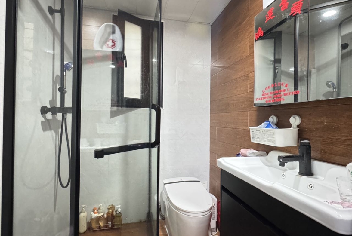 Ground floor studio at Shangfang Garden on Huaihai Road. 70 sqm, 20 sqm garden, 3 flexible rooms, steps from Changshu Road Station. 21,600 RMB/month.