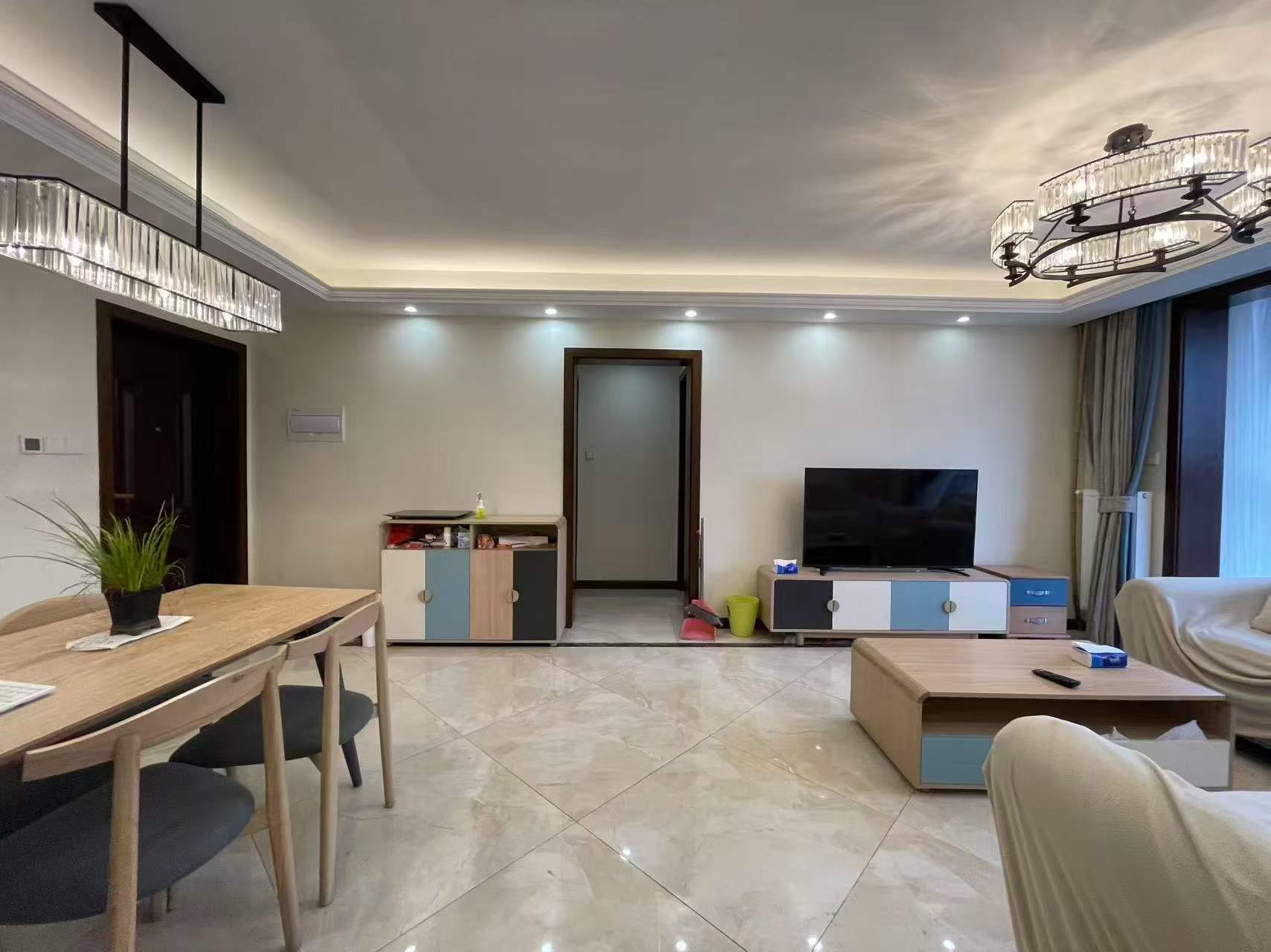 4-bed, 2-bath unit at Haisi Tower on Huashan Road. Central AC, wall heating, city views, 5 min walk to Jiaotong University Station. 22,000 RMB/month.