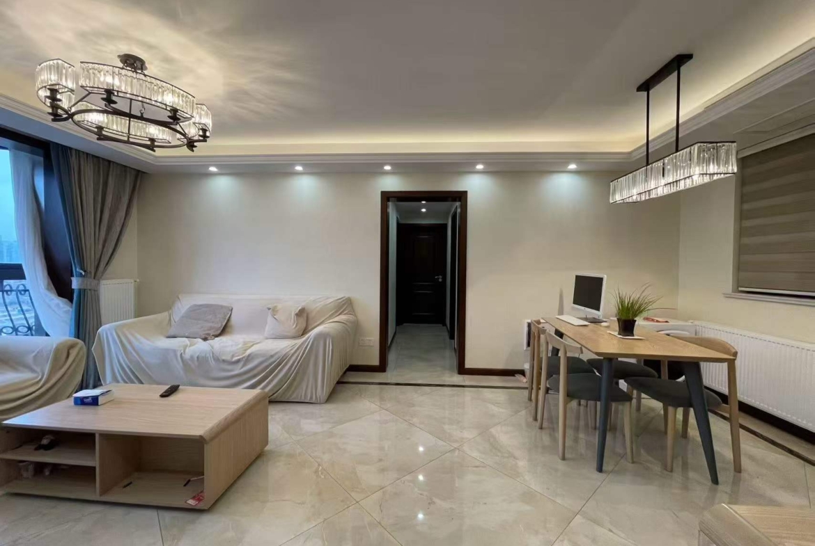 4-bed, 2-bath unit at Haisi Tower on Huashan Road. Central AC, wall heating, city views, 5 min walk to Jiaotong University Station. 22,000 RMB/month.