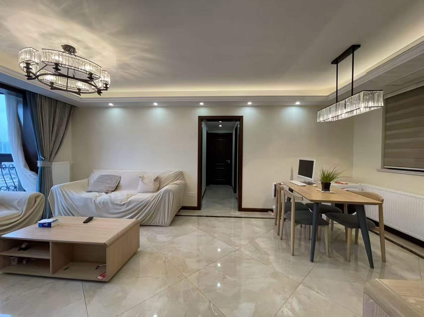4-bed, 2-bath unit at Haisi Tower on Huashan Road. Central AC, wall heating, city views, 5 min walk to Jiaotong University Station. 22,000 RMB/month.