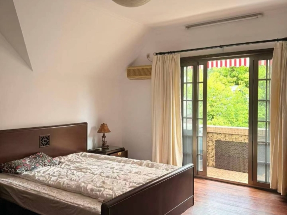 2-bed, 1-bath unit at Aitang Xincun on YUqing Road. 100 sqm, private terrace, heritage building, owner direct. Near Shanghai Library Station. 18,000 RMB/month.