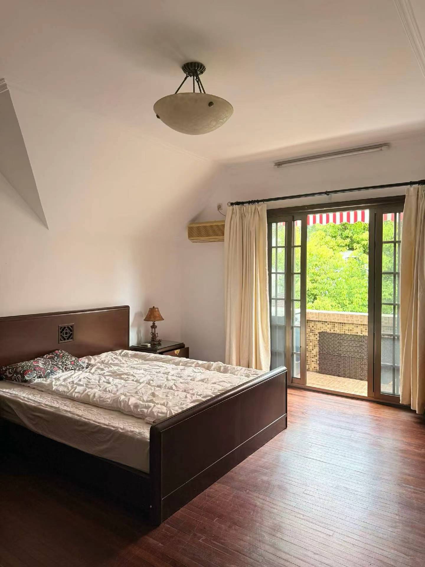 huashan-road-lane-house-2-bed-ffc-shanghai-rentals (2) 2-bed, 1-bath unit at Aitang Xincun on YUqing Road. 100 sqm, private terrace, heritage building, owner direct. Near Shanghai Library Station. 18,000 RMB/month.